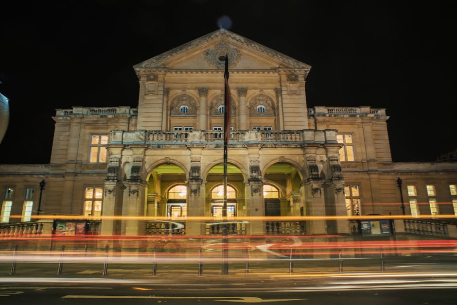 The facade of the hall at night